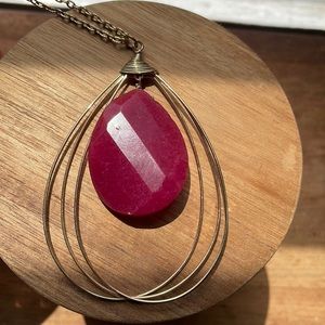 Long fancy necklace.